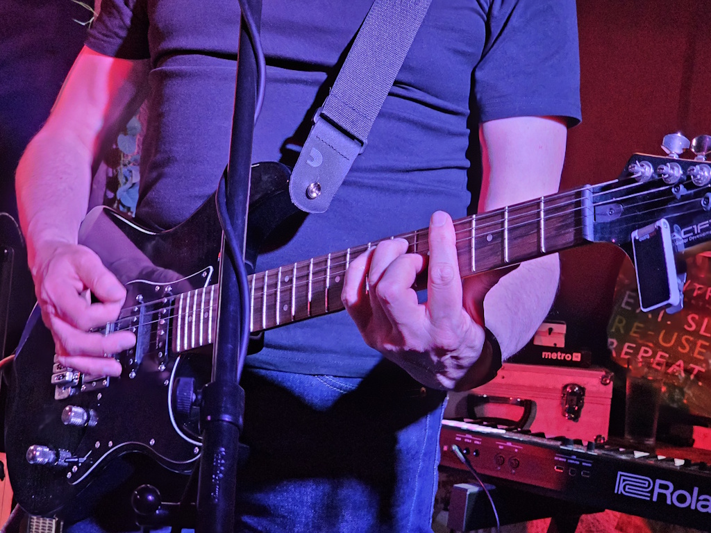 Closeup of Jim's electric guitar